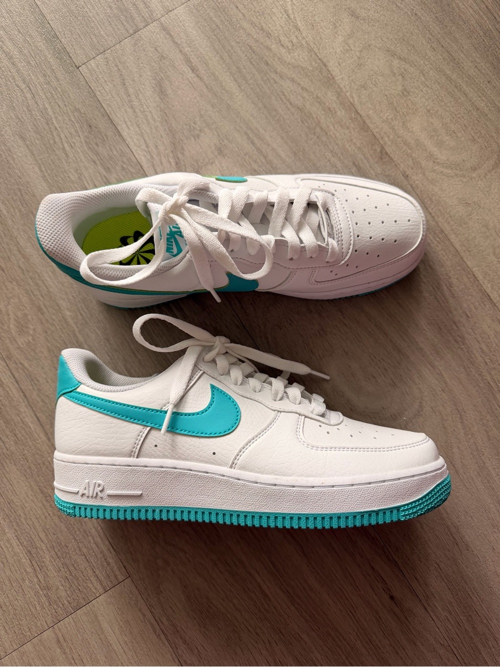 Nike White Sneakers with Teal Swoosh